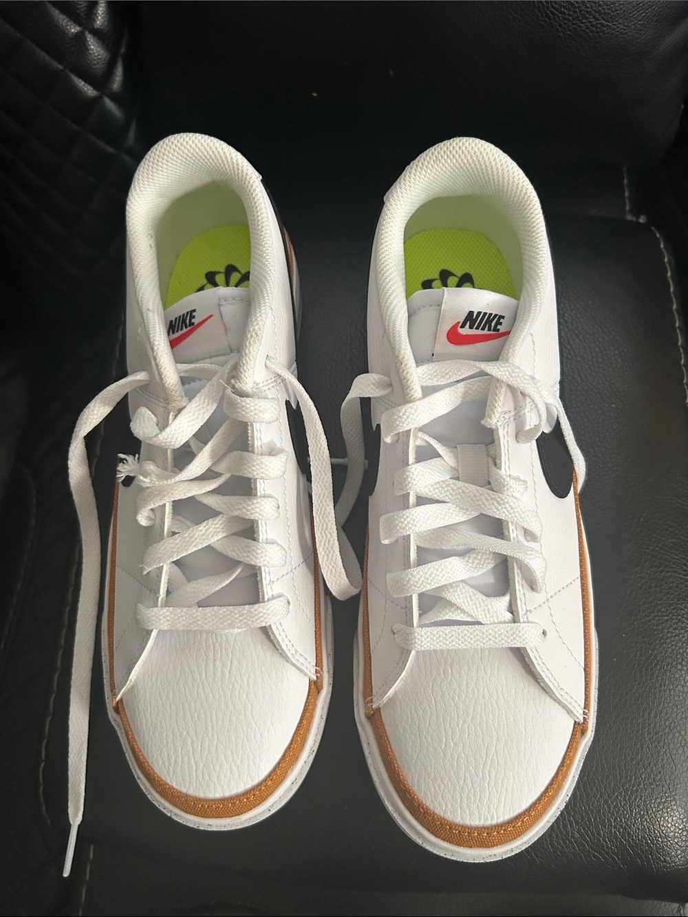 Nike White Sneakers with Black Swoosh and Brown Trim